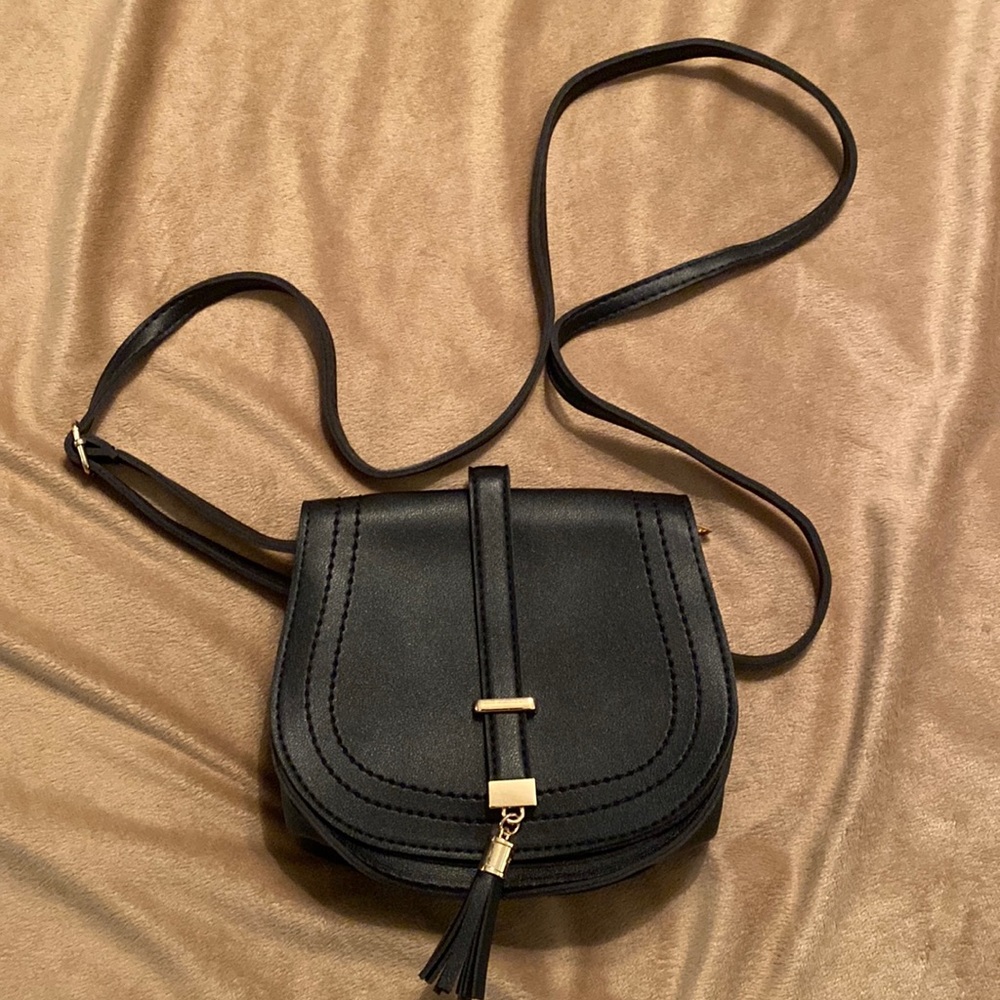 Black saddle bag. Small. Never used.